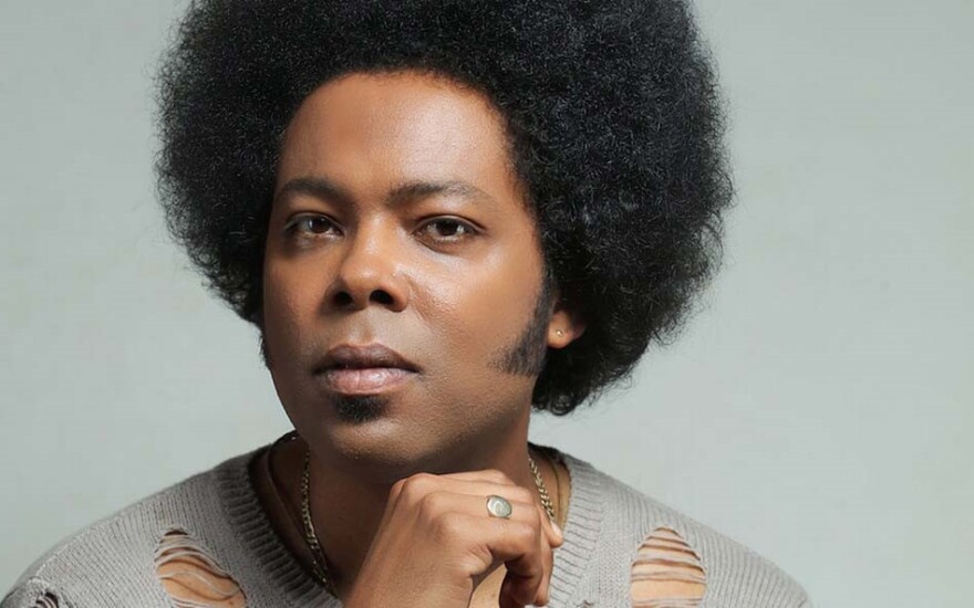 Portrait of musician Alex Cuba