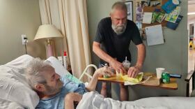 Jay Azzato, standing at right, is concerned about finding another senior care center for his brother, who is bedridden and nonverbal, after the announcement that Senior Care Center at Sunset Lake in Sullivan County will close by the end of the year.