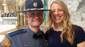 Trooper Robert Reyer poses with his wife Christina at a trooper graduation ceremony at the Washington Capitol. Originally from Austria, Reyer trained to become a doctor before moving to Washington to pursue his dream of working in law enforcement. AUSTIN JENKINS / NORTHWEST NEWS NETWORK