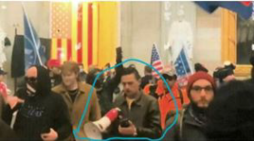 This photo allegedly shows Jeremy K. Baouche at the U.S. Capitol during the Jan. 6 insurrection.