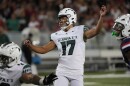 FILE - Hawaiʻi place kicker Kansei Matsuzawa (17) watches a kick in the first half during an NCAA football game against Arizona on Saturday, Aug. 30, 2025, in Tucson, Arizona.