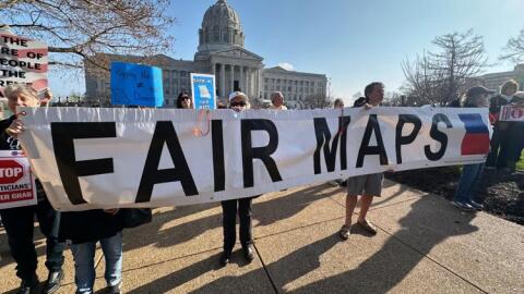People opposed to new the U.S. House districts passed by the Missouri General Assembly demonstrate outside the state Capitol on Tuesday, in Jefferson City.