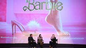 Ryan Gosling, America Ferrera and Lauren Laverne speak onstage during a special screening and Q&A for "Barbie." (Jeff Spicer/Getty Images for Warner Bros.)