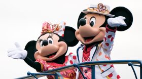 Actors dressed as Walt Disney characters Minnie Mouse (L) and Mickey Mouse (R) perform at Tokyo DisneySea in Urayasu, Japan.