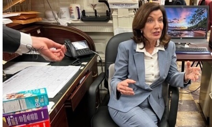 Gov. Kathy Hochul speaks to reporters inside the press room within the Capitol, March 25, 2022.