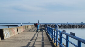 Visitors to Lake Michigan enjoy an afternoon on Milwaukee's breakwater. The city of Milwaukee is facing a fiscal cliff in 2025 due to pension obligations that could gut city services.