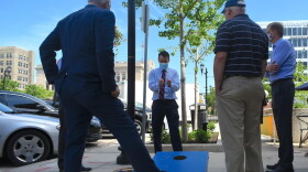 U.S. Sen. Todd Young (R-Ind.) talks to business owners in South Bend before a press conference to promote the RESTART Act bill he co-authored.