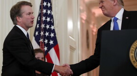 President Donald Trump shakes hands with Judge Brett Kavanaugh, his Supreme Court nominee, in the East Room of the White House on Monday, July 9. 