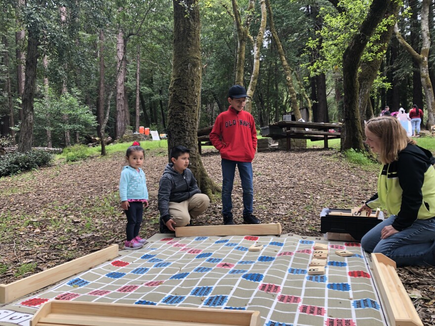 Families play outdoor games in Huddart Park