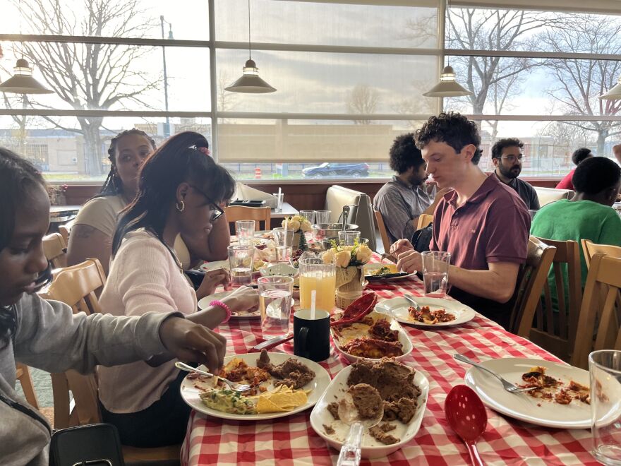 Students at Garden of Joy cook a meal to share with volunteers, family and friends. This one includes enchiladas, refried beans and grapefruit juice.