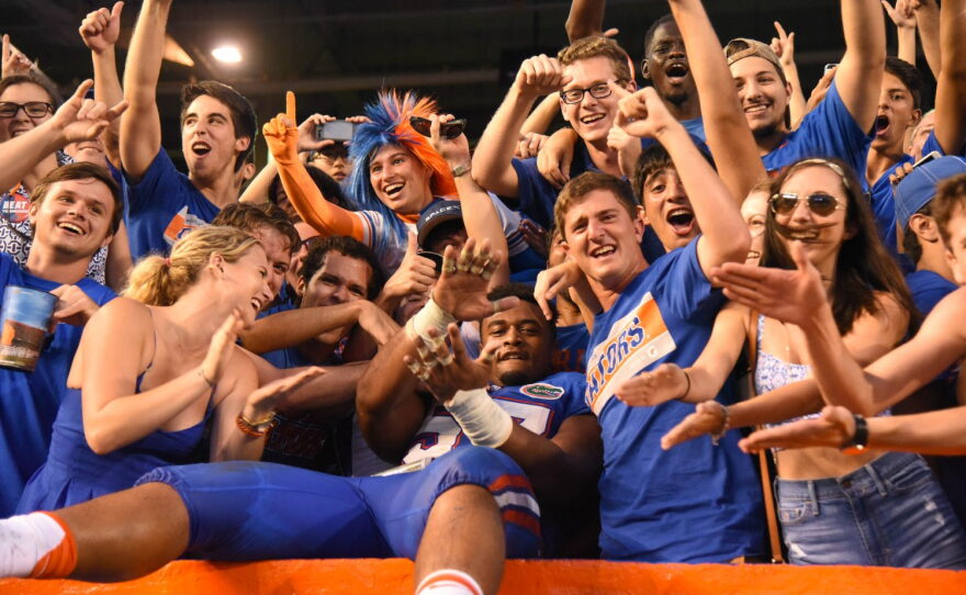 Florida defensive lineman Caleb Brantley (57) celebrates with fans after the game.
