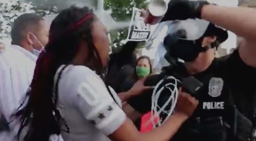 Kansas City Police Officer Nicholas McQuillen sprays a juvenile in the face during the May 30, 2020 protests near the Plaza. A Jackson County grand jury has indicted the officer. He  faces a single misdemeanor count of 4th degree assault.