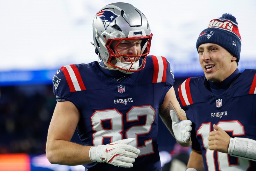New England Patriots tight end CJ Dippre (82) and quarterback Tommy Devito (16) celebrate after defeating the Miami Dolphins in an NFL football game, Sunday, Jan. 4, 2026, in Foxborough, Mass.