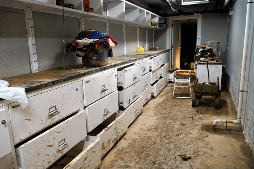 While the archives at the Hindman Settlement School were protected from the possibility of fire, feet of flood waters soaked them. The school is working to recover and preserve what they can.