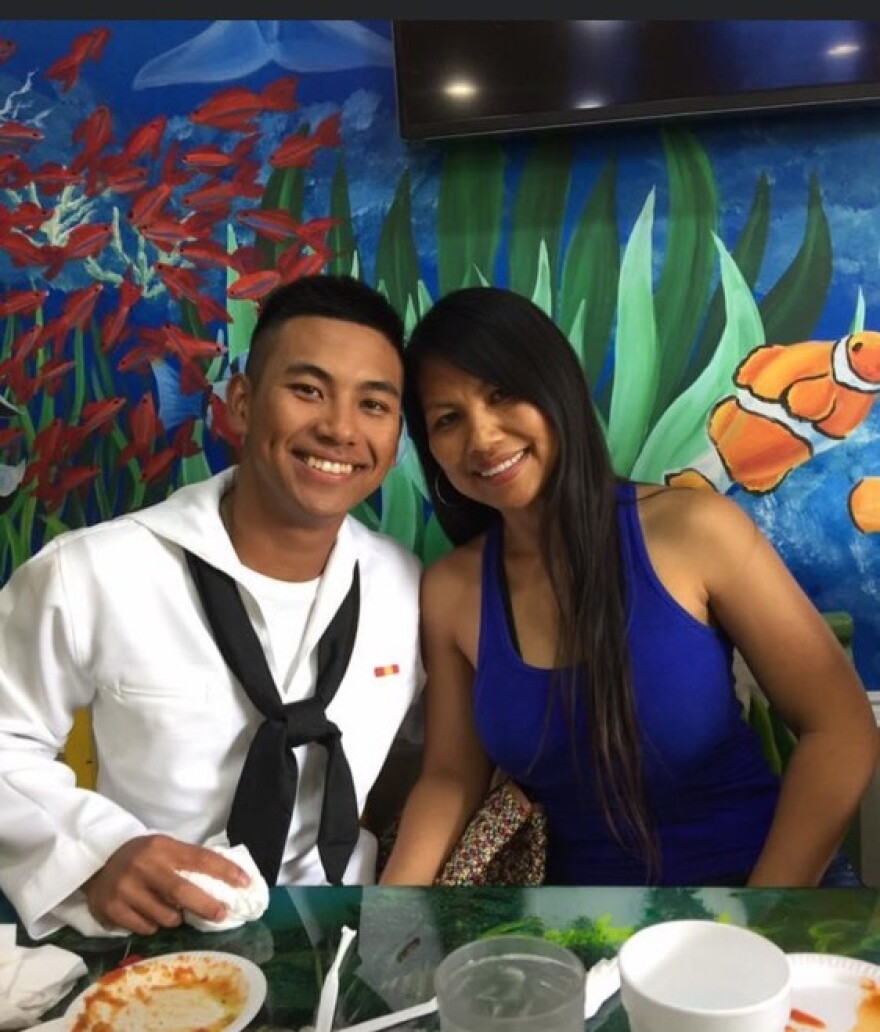 Navy Hospital Corpsman Christopher "Bobby" Gnem with his mother Nancy Vienna. 