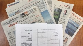 Pages of the ADN along with two lawsuits brought against the paper.
