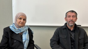 Rajaa Shindi (left), founder of the NMSU Refugee Response Project; and Said Sadullah Hashimi, a student with the program