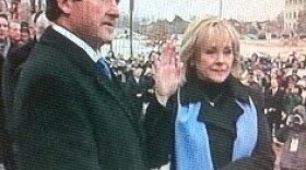 Her husband holds the Bible as Mary Fallin becomes Governor