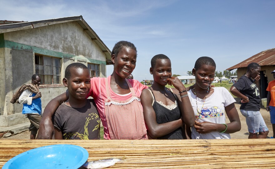 Naomy Akoth with some of her children. When her boat was grounded, she says, "I was very discouraged. Because the money I was getting ... I was using to pay for my firstborn's school fees."