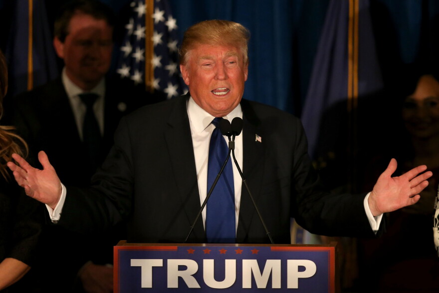 Then-Republican presidential candidate Donald Trump speaks after he had been projected to win the New Hampshire primary on Feb. 9, 2016, in Manchester, N.H.