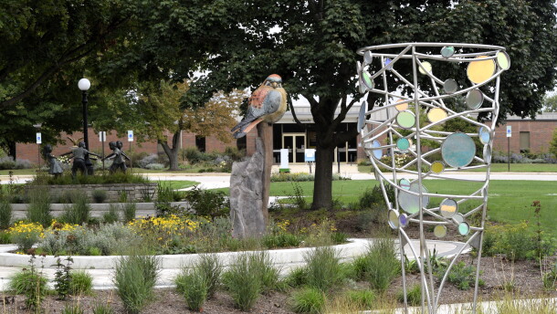 The sculpture garden at One Normal Plaza now has five pieces installed along new curvilinear paths. The garden is designed around an existing sculpture unveiled in 2008 as a tribute to the Illinois Soldiers and Sailors Children's School.