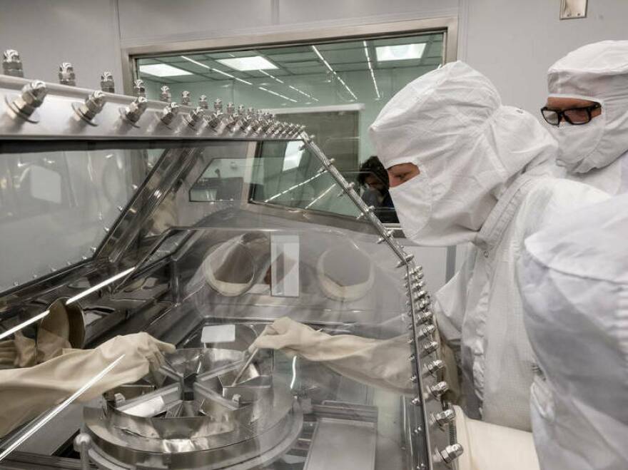 NASA's Johnson Space Center has built a new facility to house the asteroid rocks, and workers there have practiced opening the sample container in a setup that will keep the material uncontaminated.