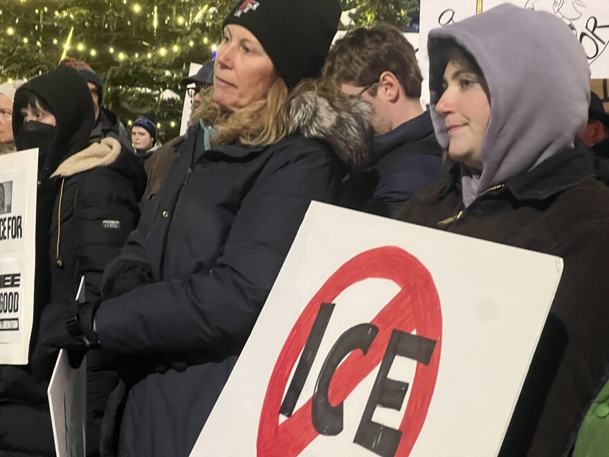 Protesters gather in Monument Square Park in Portland dressed for below freezing temperatures to voice opposition to federal immigration enforcement activities and mass deportation.