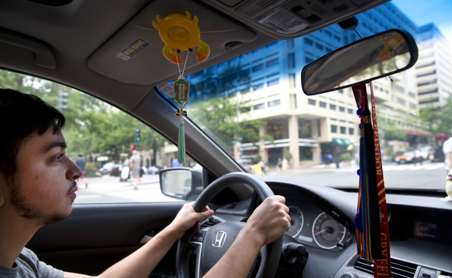 Younes drives in D.C. to meet his parents for lunch. Initially apprehensive about his transition, Younes' parents are now supportive of him as their son.