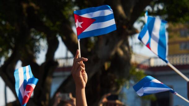 Women wave Cuban flags during a rally calling for the end of the U.S. blockade against the island nation in Havana, Cuba, Tuesday, April 7, 2026. (Ramon Espinosa/AP)