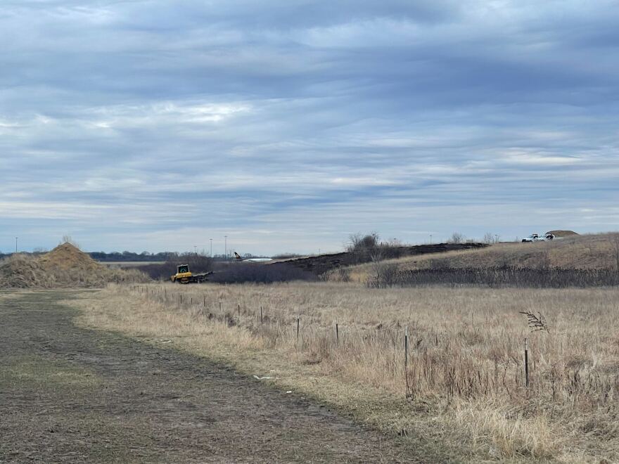 Bulldozer tears through the former site of the Bell Bowl Prairie.