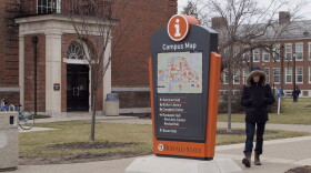 In this Jan. 27, 2017, file photo, a student goes about his day on the Buffalo State College campus in Buffalo, N.Y. Students attending college at one of New York's public universities in the spring of 2021 will have to quarantine at home for a week first and be tested for COVID-19 when they arrive on campus, officials announced Sunday, Nov. 8, 2020. (Carolyn Thompson/AP)