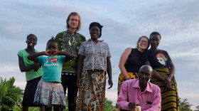 Adam Burgess, third from the left, with his host family in 2020.