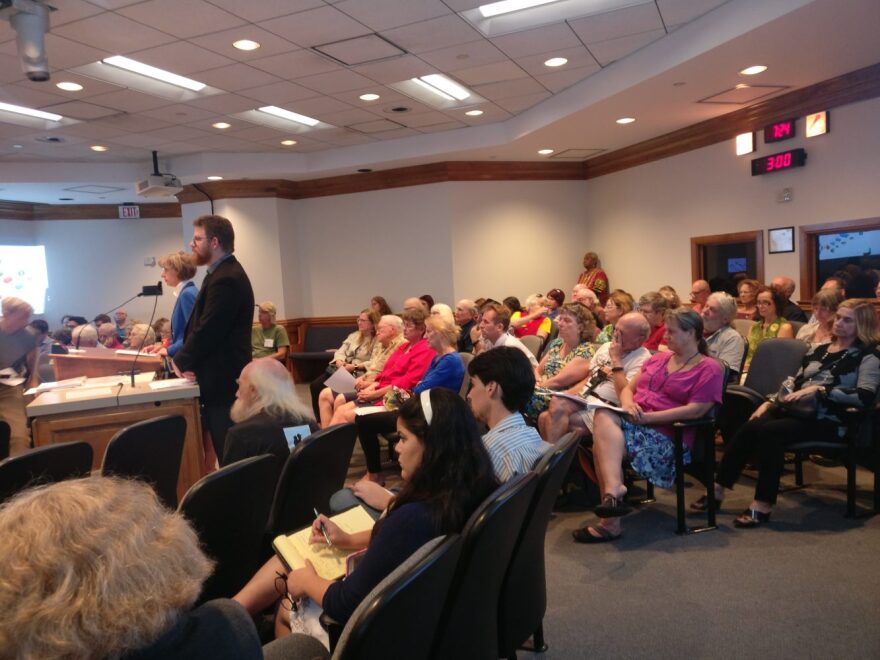 Members of the community gathered in the city commission auditorium to hear more about Gainesville's pending comprehensive plan. (Brett Pizzi/WUFT News)