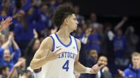 Kentucky's Koby Brea (4) celebrates his 3-point shot in the second half of an NCAA college basketball game against Florida in Lexington, Ky., Saturday, Jan. 4, 2025. (AP Photo/James Crisp)
