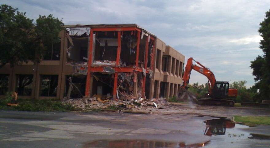 The Graves Office Building at 51st and Lewis comes down as part of the I-44 widening project.