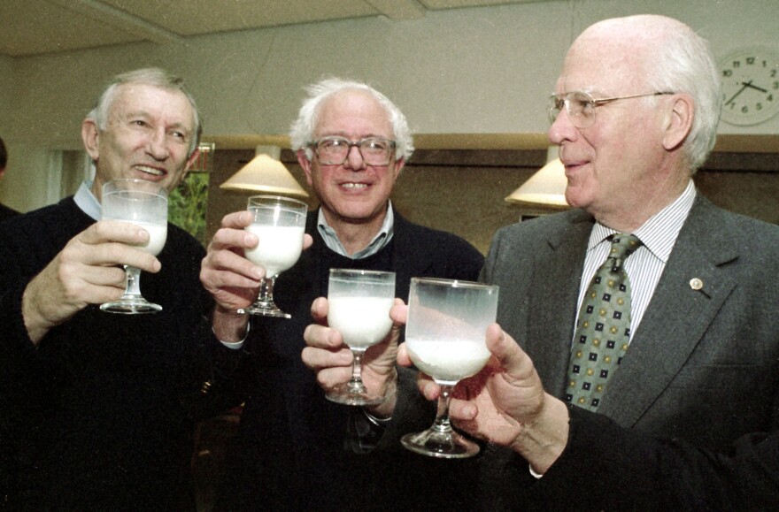 Jim Jeffords, Bernie Sanders and Patrick Leahy holding glasses of milk in 1999 in Montpelier.