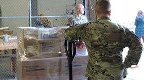 Members of Indiana's National Guard distribute supplies from the Strategic National Stockpile for hospitals across the state in April. The Guard is now working with the Secretary of State to distribute PPE to polling places
