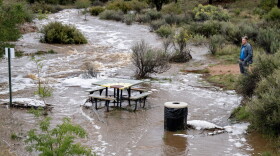 Floodwaters cover a picnic area at the Arroyo Hondo Open Space in Santa Fe on Tuesday, Sept. 26.