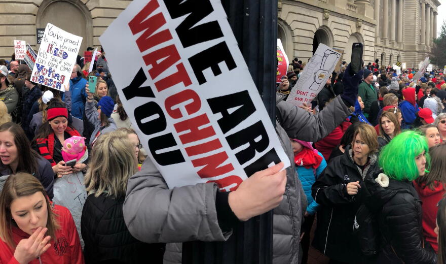 Teachers and state workers rally against proposed pension reforms outside the state Capitol during the 2018 Kentucky General Assembly.