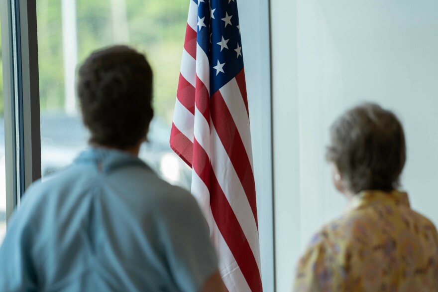A meeting of the Livingston Parish Library Board of Control opens with the Pledge of Allegiance on July 18, 2023, at the Denham Springs-Walker Branch in Denham Springs, La.