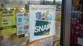 Portland, OR, USA - Oct 28, 2020: "SNAP welcomed here" sign is seen at the entrance to a Big Lots store in Portland, Oregon. The Supplemental Nutrition Assistance Program (SNAP) is a federal program.