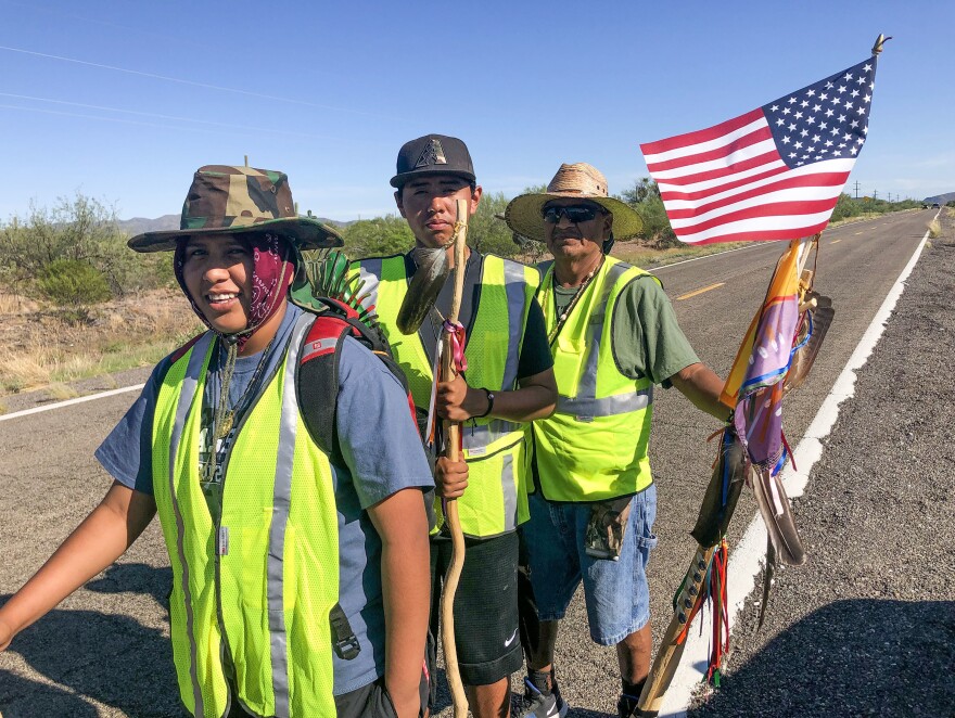 The Antone family, (left to right) Genae, Brice and Tim, tribal members of the Tohono O'odham Nation, on a pilgrimage for St. Francis.