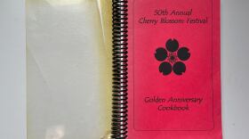 The cover of a recipe book from Honolulu Japanese Junior Chamber of Commerce celebrating its 50th Annual Cherry Blossom Festival.