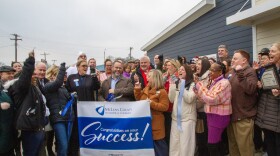 Home Sweet Home Ministries CEO Matt Burgess, staff and city of Bloomington officials cut ribbon on new non-congregate village shelter, The Bridge. McLean County Chamber of Commerce ambassadors officiated Tuesday's ceremony.