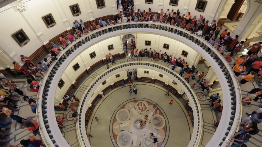 The line to enter the Senate chamber spills into multiple levels of the Texas Capitol rotunda as state Sen. Wendy Davis filibustered an abortion bill in Texas.