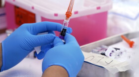 A flu vaccine is readied at the L.A. Care and Blue Shield of California Promise Health Plans' Community Resource Center. (AP Photo/Mark J. Terrill, File)