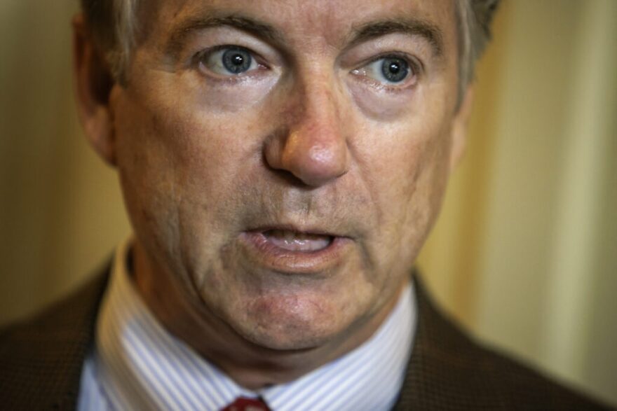 Sen. Rand Paul (R-KY) talks to reporters as he heads to the floor of the Senate for a vote on Capitol Hill on February 11, 2024 in Washington, DC.