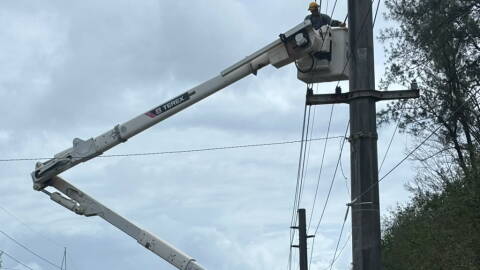GPA crews work on Route 1 following the passage of Super Typhoon Bavi on July 7, 2026.
