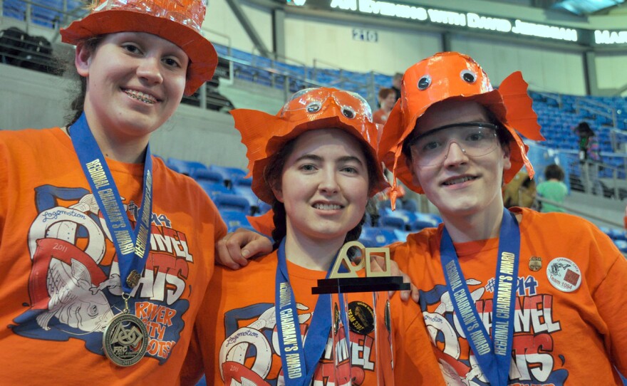 Home-schoolers Camryn Vrbka (left, from Old Monroe, Mo.) and siblings Elizabeth and Bryan Stearns (from St. Peters, Mo.) are members of the FIRST Robotics team the Channel Cats, which won the St. Louis Regional Chairman’s Award.