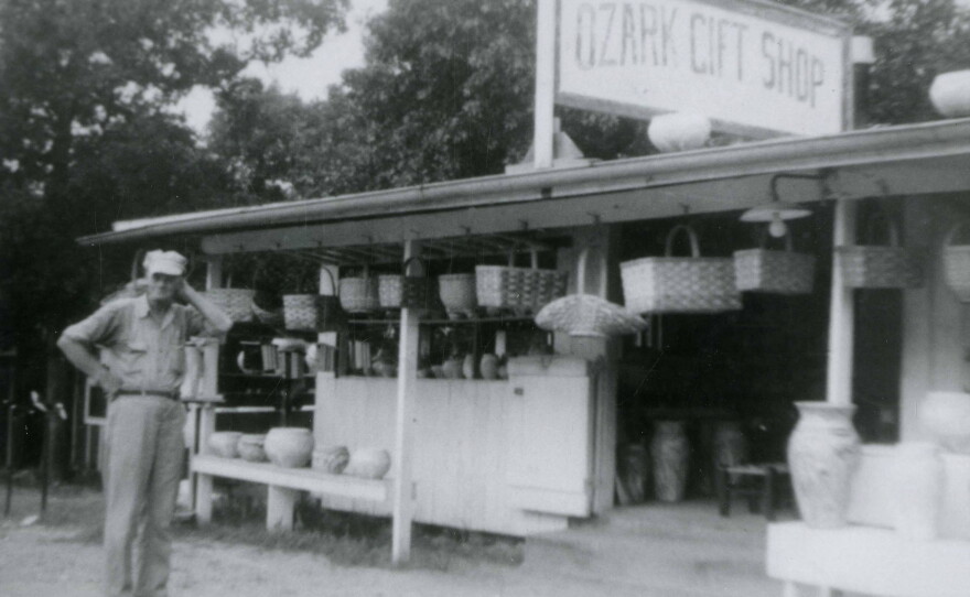 Darius Bartram standing in front of his Ozark Gift Shop, circa 1940